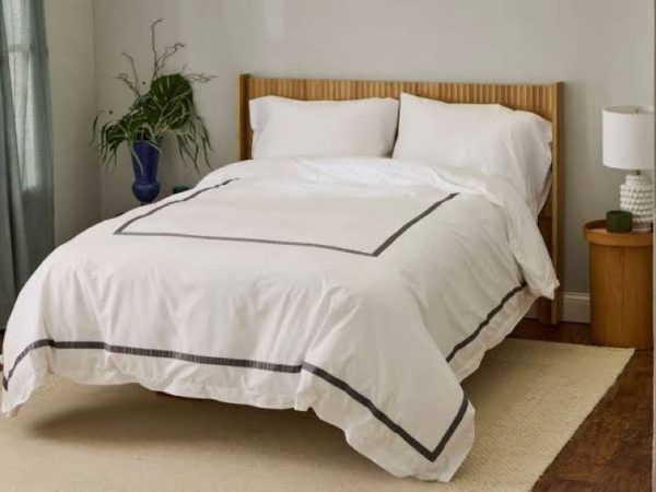 Elegant white bedding collection resembling premium hotel linens